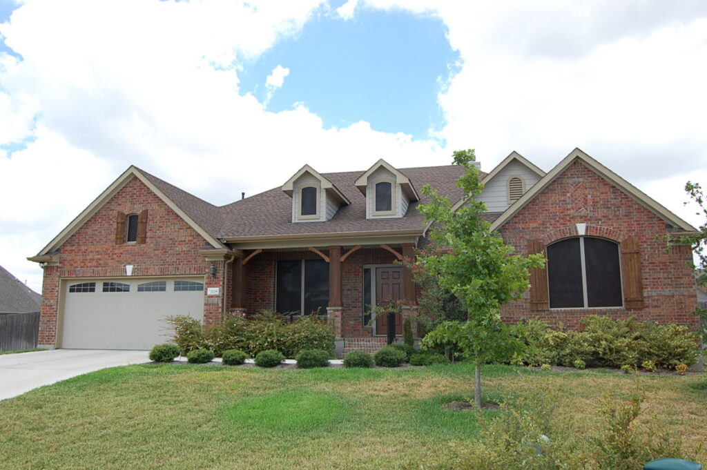This is the home's front side of this Round Rock TX solar screen installation.