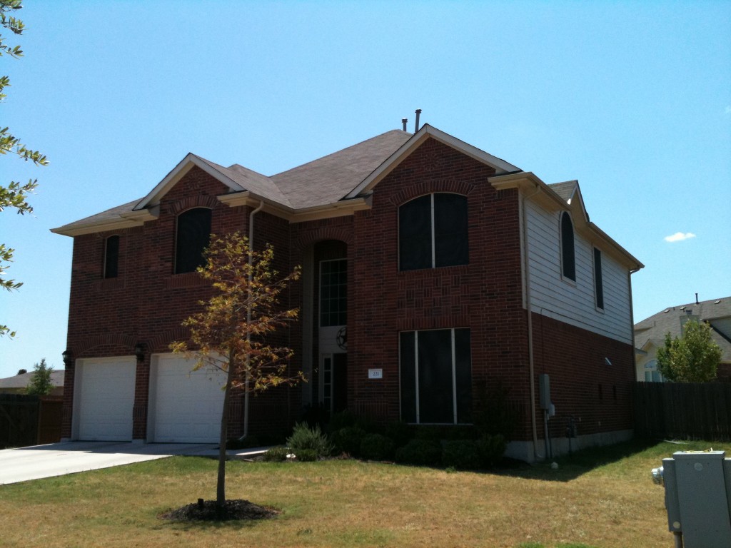 Kyle TX solar screens installation for a home in the Hometown Kyle Subdivision.