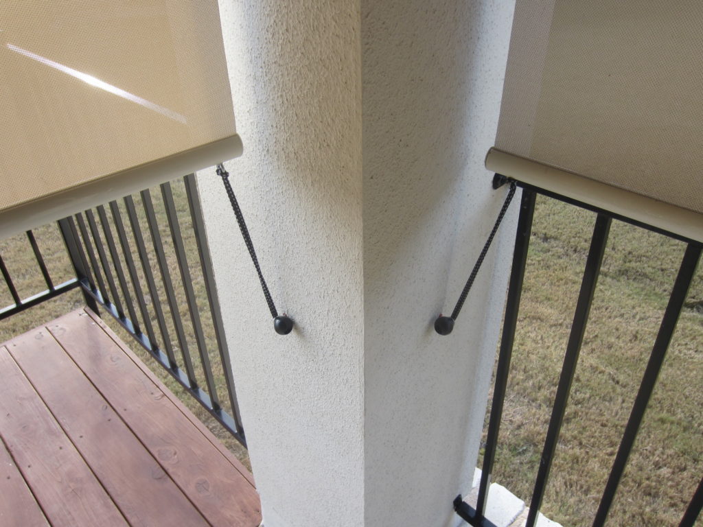 Tie Downs for our Austin TX exterior patio roller shades.