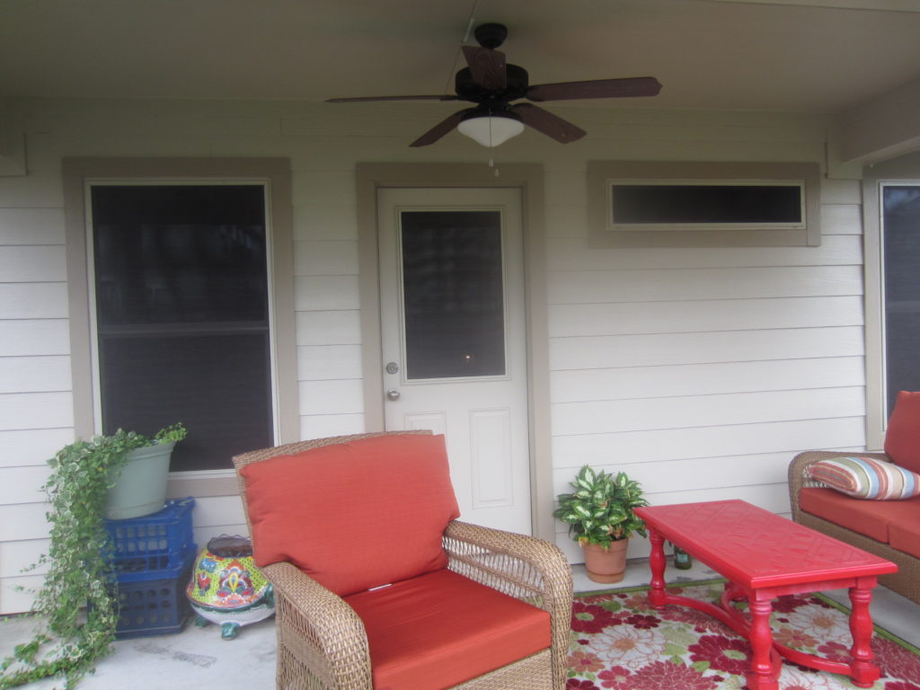 80% vinyl window solar screen installation underneath the back patio.