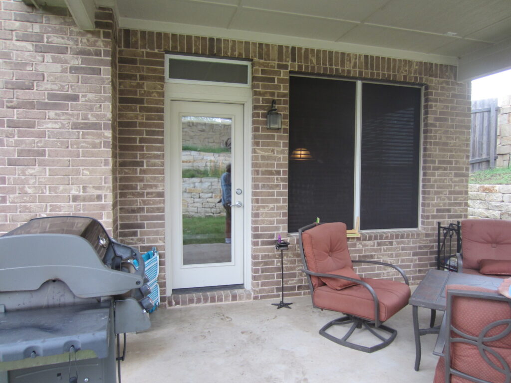 No solar screen for door under patio covering