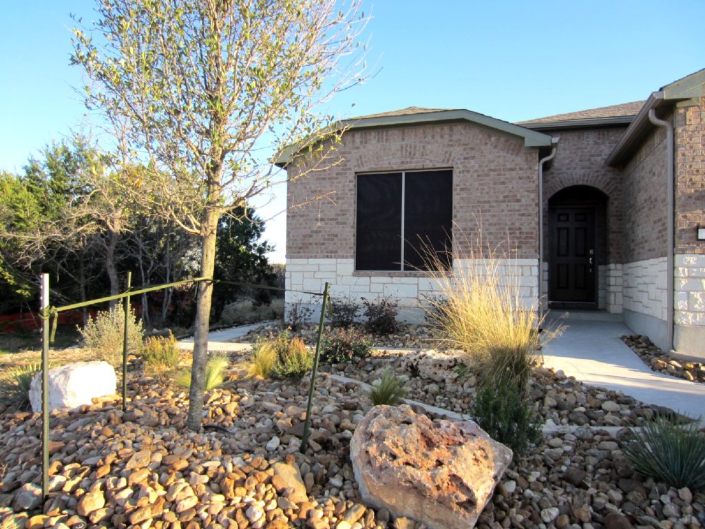 For the front of this Sun City Georgetown TX solar screens installation, we used the 90% solar screen fabric.