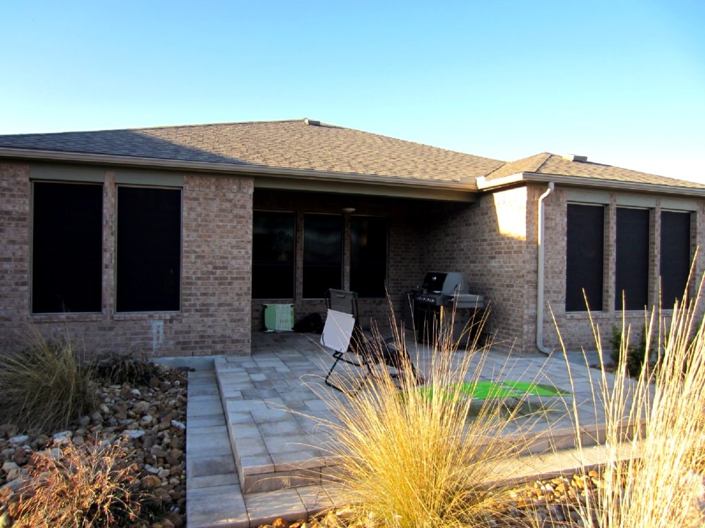 On the back side of this Sun City Georgetown TX solar screens installation, we used one 80% solar window screens under the patio. And 90% solar screens for the windows that are not under the covered patio.