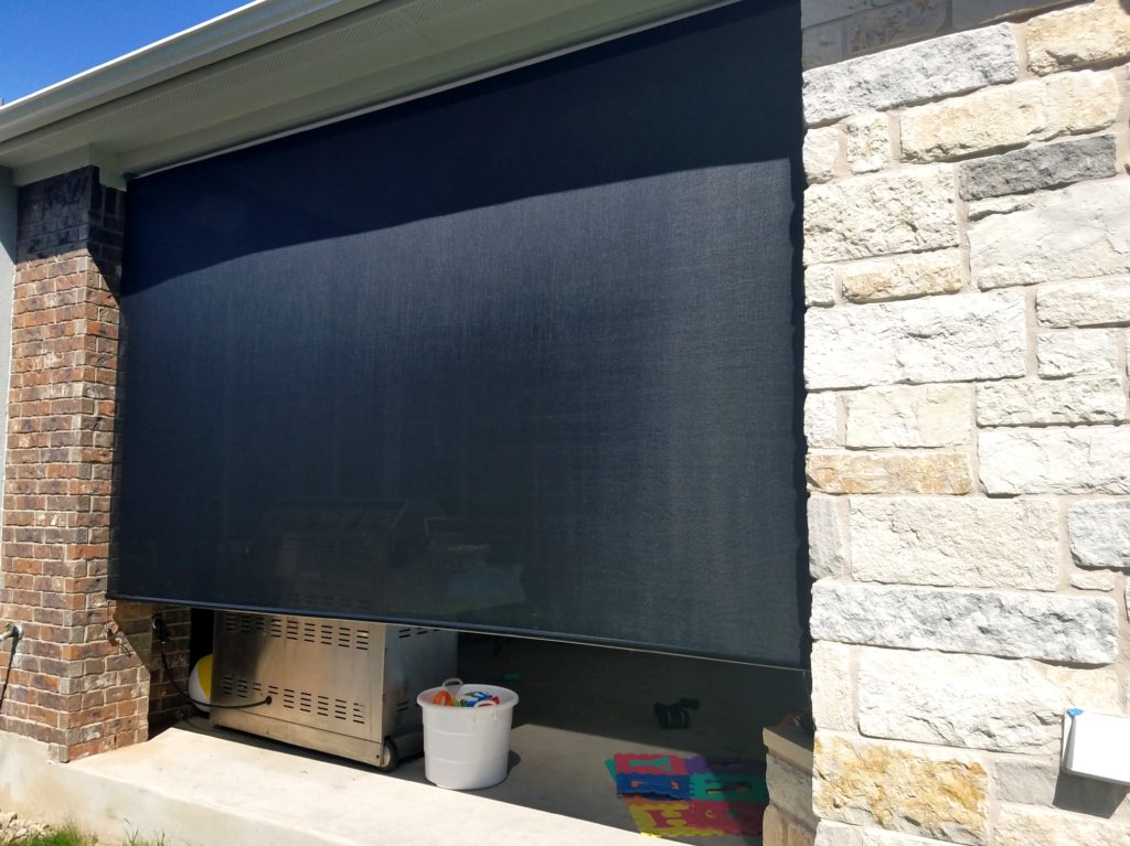 140 in wide outdoor roller shade for Georgetown Texas patio.