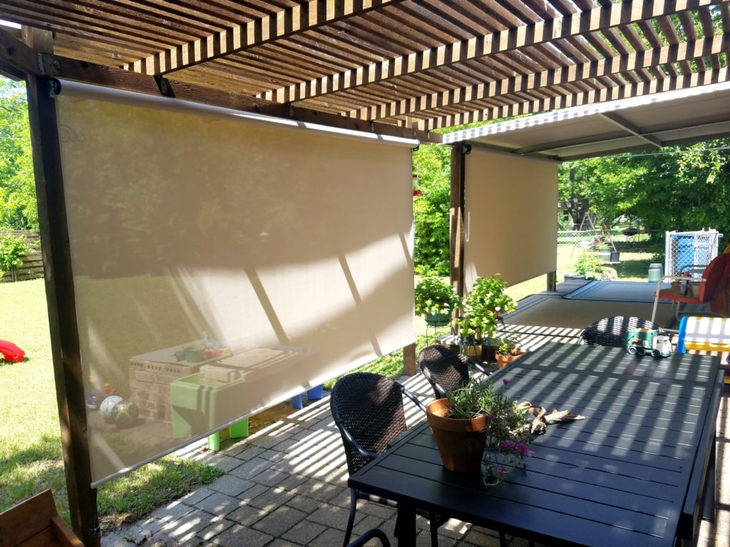 The installed cost for these two porch shades was $722. The installed price of $722 included one measure trip, one installation trip, sales-tax and (2) 106" wide exterior patio porch shades. 97% beige fabric.