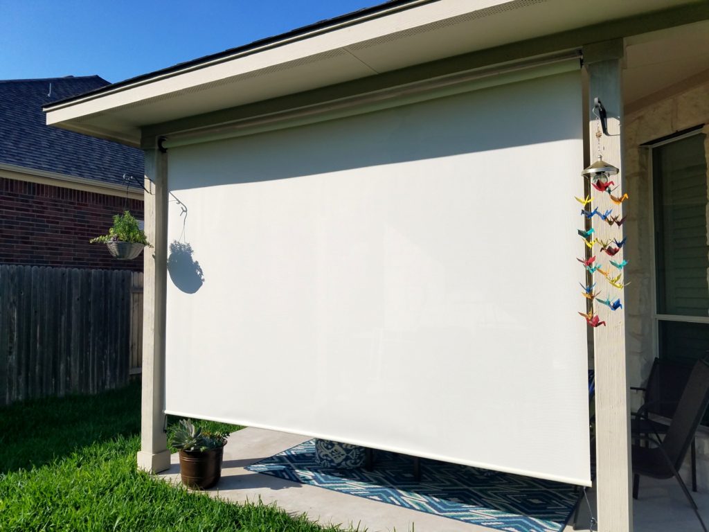 Outdoor roll up blind we made using our 97% Beige / White Fabric.