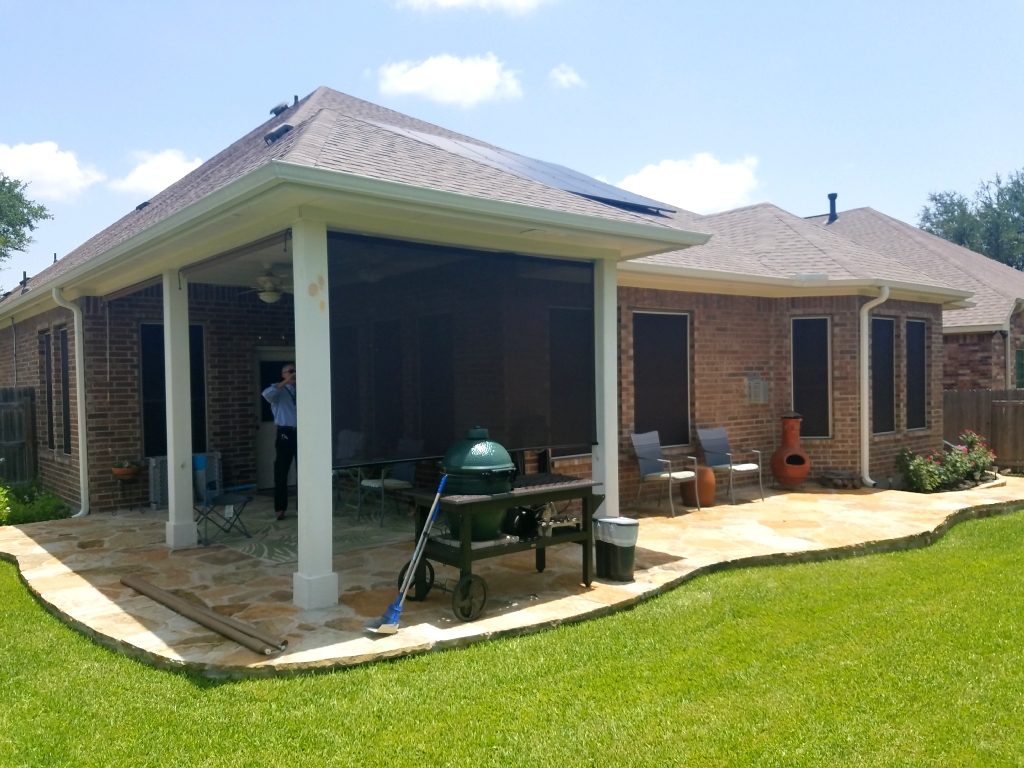 Round rock TX home with solar window screens and a new patio roller shade. All made out of the same Chocolate brown 90% solar shade fabric.
